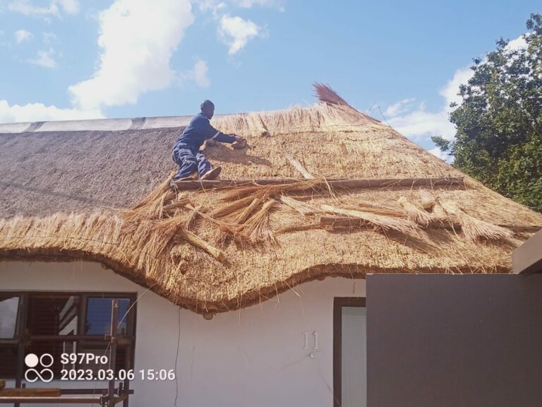 Rooftop construction with thatched roofs