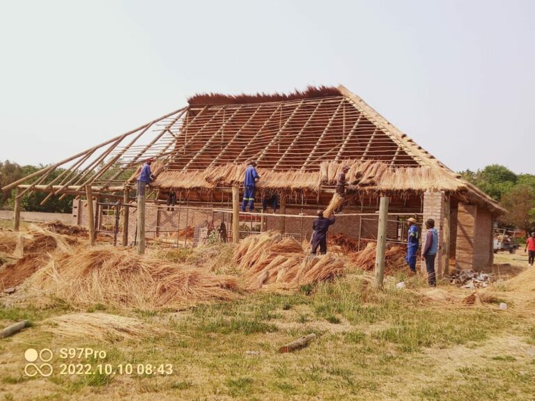 Roofing installation team at work